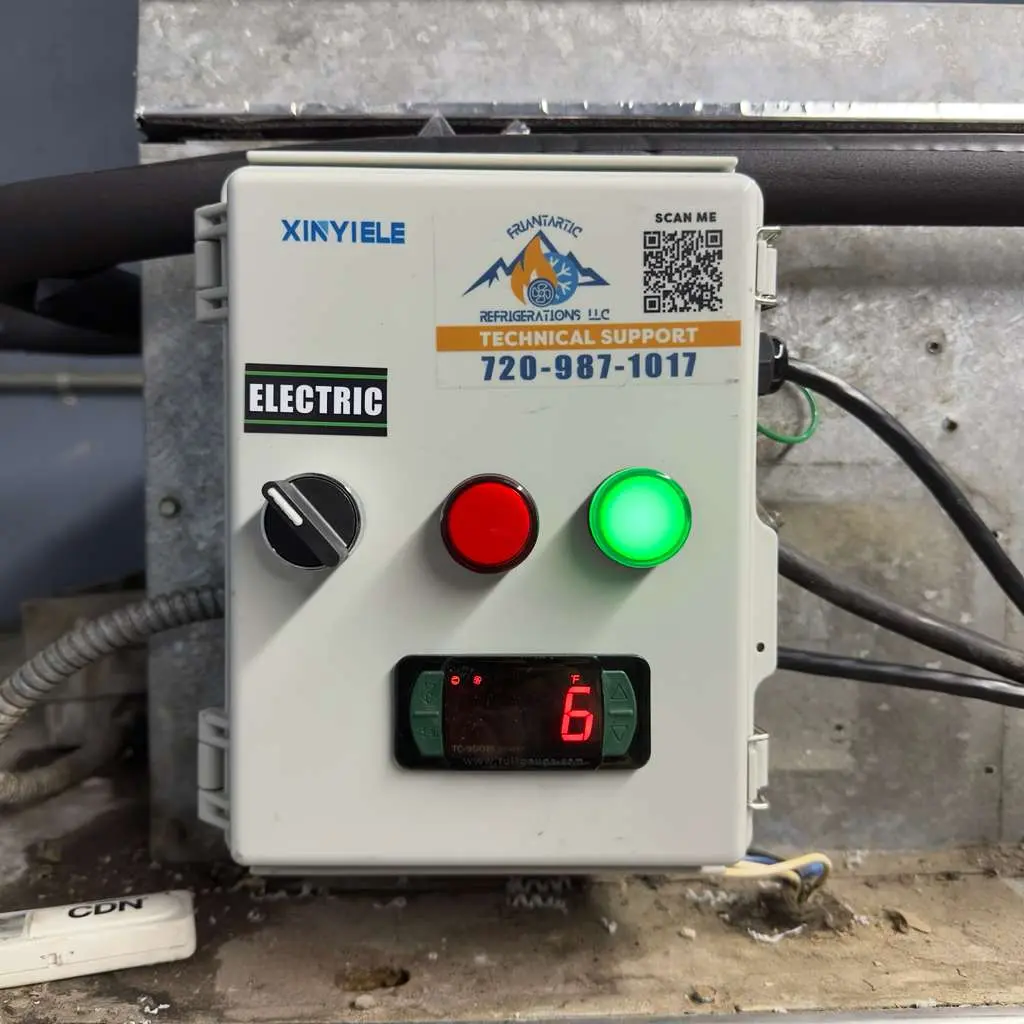 Refrigeration control box with the Friantartic technical support sticker